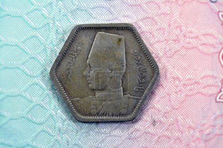 Photo for Ancient hexagon old two 2 piasters coin at the era of king Farouk I features value and kingdom of Egypt on a side and a bust of King Farouk the 1st on the other side, vintage retro coin - Royalty Free Image