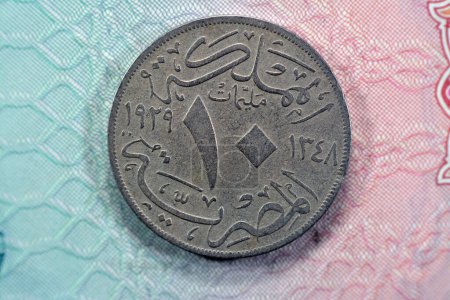 Photo for Vintage retro old and ancient historic 10 Ten Egyptian milliemes coin series 1929 AD 1348 AH features bust of king Fuad I of Egypt on obverse side and value and date on reverse side, old coin - Royalty Free Image