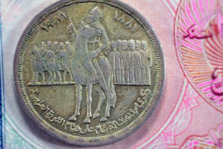 Photo for One Egyptian pound 1 LE EGP commemorative coin, Ahmed Orabi's 100th Anniversary Revolution 1881 AD, series 1981 AD 1402 AH, revolt man on a horse with followers on a side, value and date on other side - Royalty Free Image
