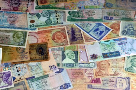 Photo for Various old cash money banknotes from different countries of the world, stack of multiple currencies, pile of vintage retro bills of different origins with profiles of country leaders, ancient money - Royalty Free Image