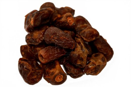 Photo for Dried dates fruit, Ramadan dried fruits Yameesh of dried dates that is used in Ramadan Khoshaf or compote that the fasting Muslims start their breakfast on it, selective focus of Ramadan background - Royalty Free Image