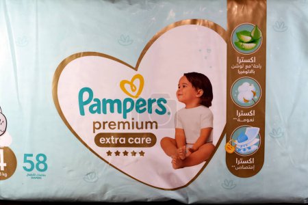 Photo for Cairo, Egypt, March 15 2023: Pampers premium extra care diapers with lotion with Aloe Vera, Pampers is a brand of baby and toddler products marketed by Procter and Gamble, baby care product - Royalty Free Image