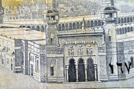 Photo for Al-Masjid al-Haram (Holy mosque), Mecca, Saudi Arabia from the obverse side of 10 SAR Saudi Arabia riyals cash money currency banknote, vintage retro old 10 riyals, selective focus - Royalty Free Image