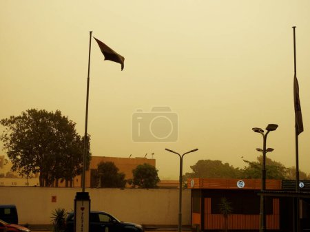 Photo for Cairo, Egypt, June 1 2023: A blurry view during a sandstorm hitting Egypt with the increase of wind speed and decrease of the level of visibility, Egypt witness sand storm and increase in temperature - Royalty Free Image