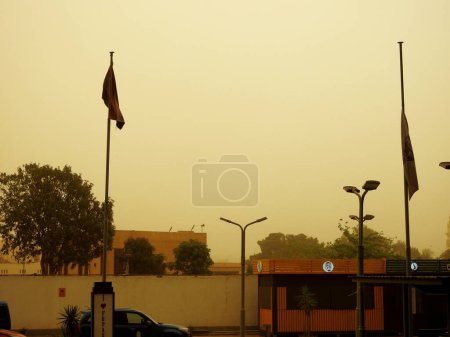 Photo for Cairo, Egypt, June 1 2023: A blurry view during a sandstorm hitting Egypt with the increase of wind speed and decrease of the level of visibility, Egypt witness sand storm and increase in temperature - Royalty Free Image