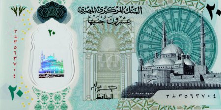 Foto de Gran fragmento del lado anverso del nuevo billete egipcio de 20 EGP LE veinte libras de polímero en efectivo cuenta con la mezquita Mohamed Ali y adornado con puntos táctiles ADA Braille a lo largo - Imagen libre de derechos