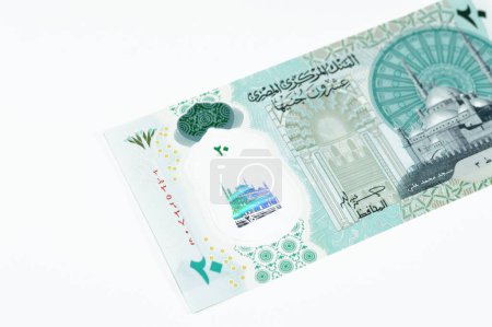 Foto de Lado anverso del nuevo billete egipcio de 20 EGP LE veinte libras de polímero en efectivo cuenta con la mezquita Mohamed Ali y adornado con puntos táctiles ADA Braille a lo largo, billete de dinero nuevo egipcio - Imagen libre de derechos