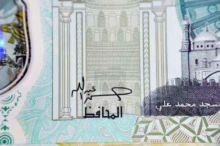 Photo for Closeup new Egyptian 20 EGP LE twenty polymer pounds cash money banknote bill with Mohamed Ali Mosque, adorned with tactile ADA Braille dots, queen Cleopatra, Great Pyramid, pharaonic military chariot - Royalty Free Image