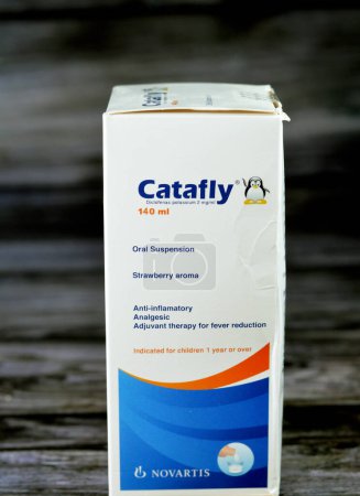 Photo for Cairo, Egypt, July 9 2023: Catafly suspension Diclofenac potassium for children, Anti-inflammatory, Anti-pyretic and Analgesic. Strawberry flavour by Novartis, a global healthcare company - Royalty Free Image