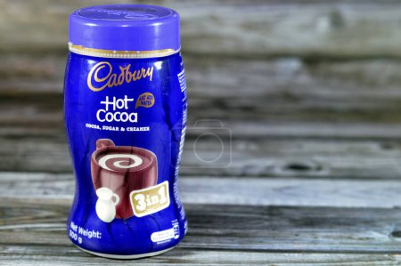 Photo for Giza, Egypt, August 12 2023: Cadbury hot chocolate powder, for fast hot cocoa, just adding hot water to the powder, a heated drink consisting of shaved or melted chocolate or cocoa powder - Royalty Free Image