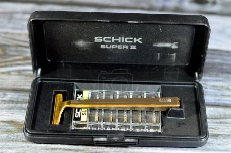 Photo for Giza, Egypt, August 12 2023: Old Schick Super II handle and razors, Schick is an American brand of personal care products and razors, founded by Jacob Schick, owned by Edgewell Personal Care - Royalty Free Image