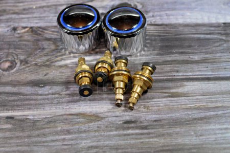 Photo for Plumbing and maintenance concept background at home, faucet body cartridge parts, changing faucets and taps home issues, replacement an old parts with new ones, home service maintenance concept - Royalty Free Image