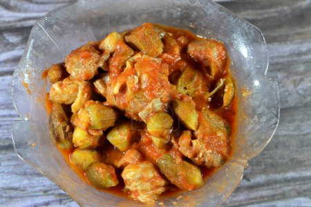 Okra cooked with beef meat pieces and tomato sauce, Bamia, bamya or Okro is Abelmoschus esculentus, known in many English-speaking countries as ladies' fingers or ochro, Egyptian Okra dish with meat
