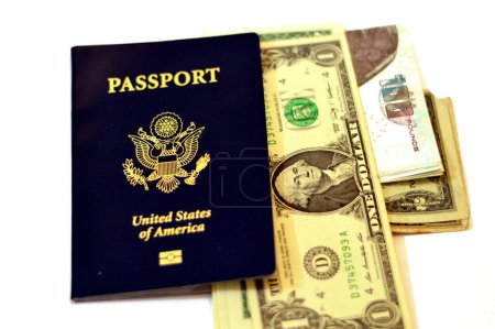 Egyptian money pounds and USD American dollars with The United States of American passport, passports are issued to the American citizens and nationals, Travel, tourism concept, American visa