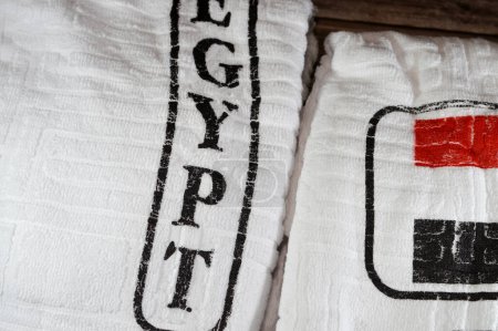 Ihram clothing Ahram with the Egyptian flag, worn by Muslim people while in a state of Iram, during either of the Islamic pilgrimages, Hajj and or Umrah, selective focus