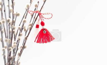 Martenitsa, Baba Marta, Martisor With Willow Twig on White Background. Traditional Symbol of Holiday March 1. Grandma Marta Day Celebration In Romania,Bulgaria,Moldova. Copy Space For Text.Horizontal.