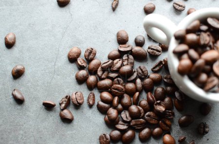Photo for Roasted coffee beans and coffee bean on wood background with space for your text. - Royalty Free Image