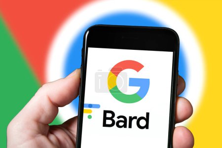 Photo for Bard AI Goggle Chrome chatbot extension, artificial intelligence tool. Man with smartphone using Bard Ai website. mobile screen with Bard AI - Royalty Free Image