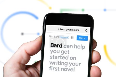 Photo for Screen of a smartphone with Goggle Bard AI tool, artificial intelligence. Man using Bard the AI chatbot by Google on a mobile. Google Bard website and logo - Royalty Free Image
