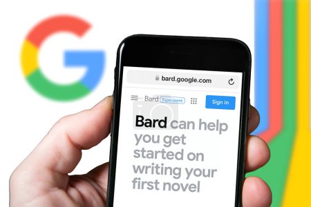 Photo for Goggle Bard AI chatbot tool, artificial intelligence. Man with smartphone using Bard Ai website. mobile screen with Bard AI - Royalty Free Image