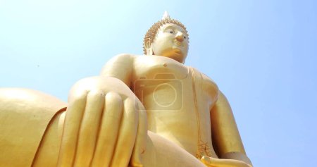 Photo for Big buddha statue The glittering golden color is beautiful. Wat Muang, Ang Thong Province, Thailand - Royalty Free Image