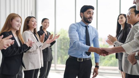 Photo for Successful business team is clapping. Happy business people clapping hands. Company workers applauding colleagues in corporate meeting - Royalty Free Image