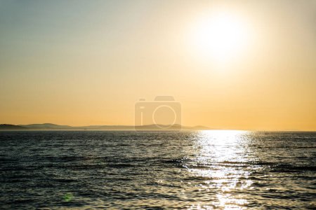 Photo for Sunset over the Adriatic sea and Ugljan island seen from Zadar, Croatia. - Royalty Free Image