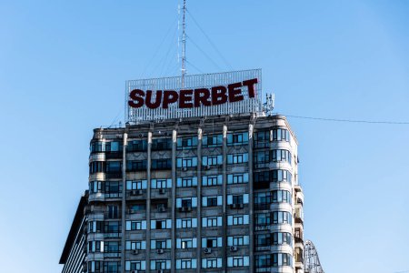 Photo for BUCHAREST, ROMANIA - MARCH 19, 2023: Superbet logo on a building in Victory square. - Royalty Free Image