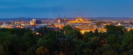 Photo for Panoramic, very detailed, evening  cityscape. Illuminated historical centre of city Olomouc in blue hour, UNESCO site, ancient town and tourist spot in Central Moravia, Czech Republic. - Royalty Free Image