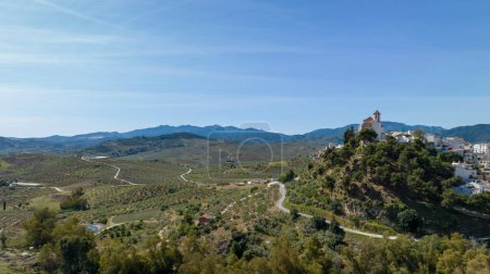 Photo for Aerial view of the village of Alozaina in the region of the Sierra de las Nieves National Park, Andalusia - Royalty Free Image