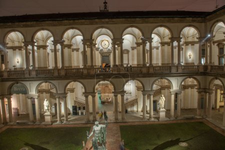 Photo for Milan Italy December 17 2022: Cloister of the Pinacoteca di Brera illuminated at night - Royalty Free Image