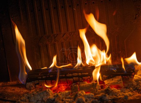 Photo for Wood burning in the fireplace - Royalty Free Image