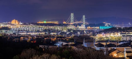Photo for Panoramic View of in Residential Suburb and Suspension Bridge at Night. High quality photo - Royalty Free Image