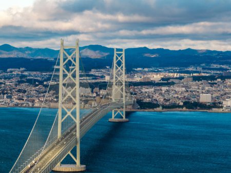 Photo for Aerial View of Light Traffic and Akashi Suspension Bridge on Cloudy Day. High quality photo - Royalty Free Image
