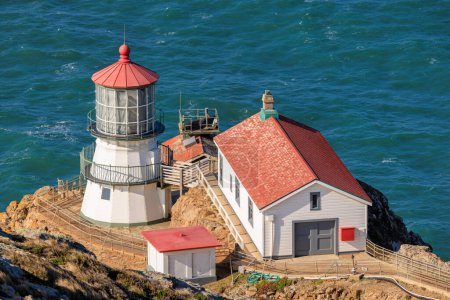 Photo for Historic lighthouse and residence building on rocky California coast. High quality photo - Royalty Free Image