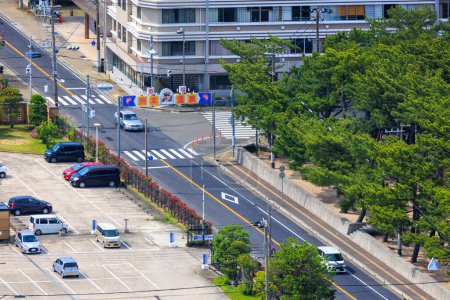 Photo for Sumoto, Japan - May 6, 2023: Quiet intersection with sign of small town on Awaji Island. High quality photo - Royalty Free Image