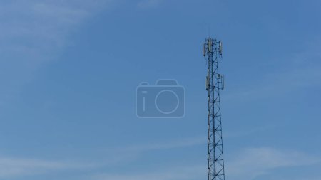 Internet provider tower with blue sky background. wireless cellphone antenna tower. radio tower