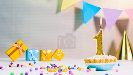 Photo for Happy birthday card from candles with the number 1, golden numbers from candles for congratulations on any holiday with beautiful holiday decorations, boxes for congratulations with a cupcake or pie and candles - Royalty Free Image
