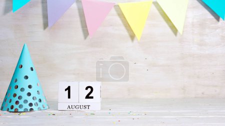 Photo for Birthday August 12 on the calendar. Happy birthday card with date copy space. Holiday decorations for congratulations, place for text - Royalty Free Image