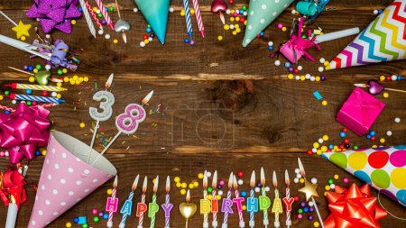 Foto de Top view of decoration birthday copy space. Happy birthday to thirty-eight. Beautiful congratulations for 38 years. - Imagen libre de derechos