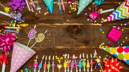 Foto de Top view of decoration birthday copy space. Happy birthday to sixty nine years old. Beautiful congratulations for 69 years. - Imagen libre de derechos