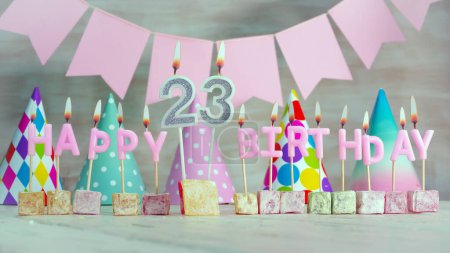 Téléchargez les photos : Happy birthday number 23 in pink pastel colors for a girl or woman. Happy birthday greeting card - en image libre de droit