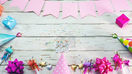 Téléchargez les photos : Happy birthday number 23. Copyspace. Beautiful card in pastel pink colors for a woman or a girl. Decorations festive place for your text. - en image libre de droit