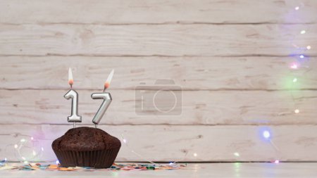 Photo for Festive card Happy Birthday with number of burning candles. Beautiful background copy space, happy birthday with digit number 17 - Royalty Free Image