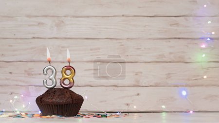 Foto de Festive card Happy Birthday with number of burning candles. Beautiful background copy space, happy birthday with digit number 38 - Imagen libre de derechos