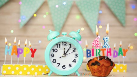 Foto de Happy birthday greeting card with muffin pie and retro clock on clock hands new birth. Beautiful background with decorations festive happy birthday decoration with number 41 - Imagen libre de derechos