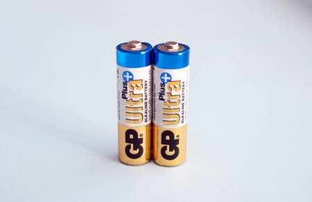 Batteries for devices. Alkaline finger batteries GP ultra, copyspace. Editorial Ukraine 12.02.2023