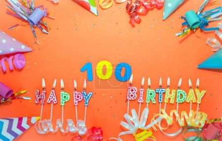 Photo for Top view birthday background with number  100. A beautiful holiday postcard on a colorful background with decorations. Anniversary congratulations with a number. Words from candles birthday. - Royalty Free Image