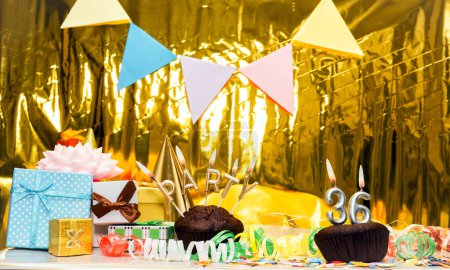 Date of Birth  36. Festive party word from candles. Scenery with gift boxes, greeting card anniversary gold background. Birthday. copy space
