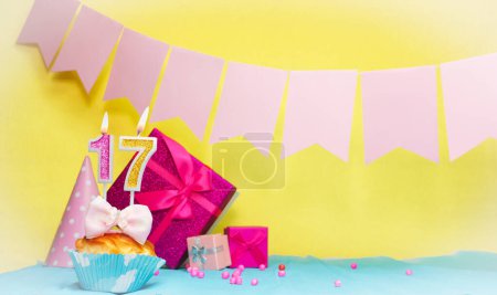 Photo for Date of birth with cake and number  17. Colorful card happy birthday for a girl. Copy space. Anniversary card pink. Congratulations on the decorations are beautiful. - Royalty Free Image